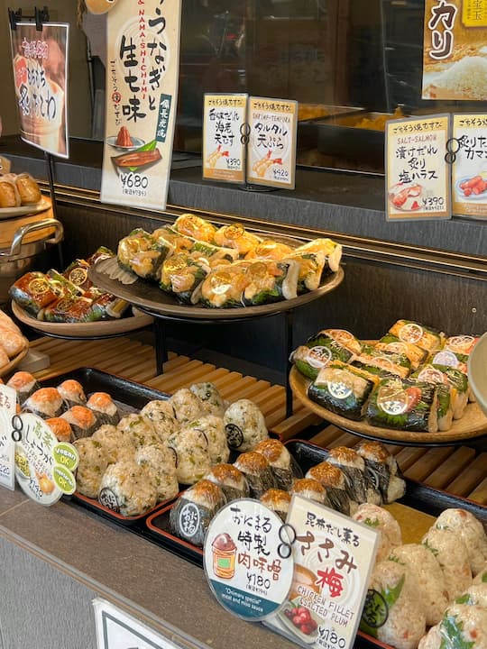 Variety of flavors of onigiri available at KYOTO ONIMARU, an onigiri (rice ball) shop in Kyoto