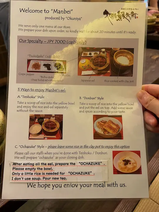 Menu at Okuniya Mambei, a Kyoto unagi restaurant, featuring the 3 Ways to Enjoy Mambei's Eel